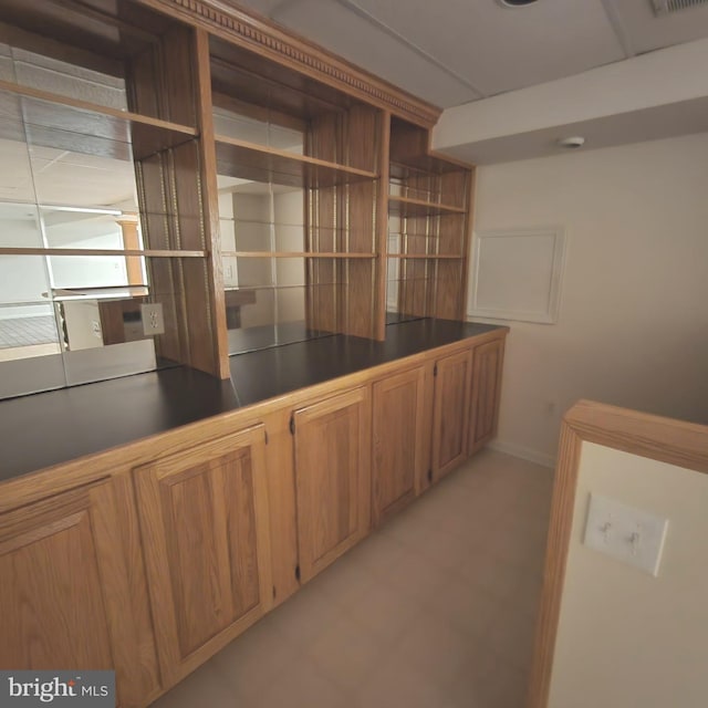 184 Steven Ln, Wilmington, DE 19808 - bar with baseboards and light floors