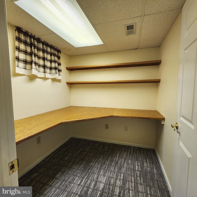 184 Steven Ln, Wilmington, DE 19808 - unfurnished office featuring built in desk, dark colored carpet, and a drop ceiling