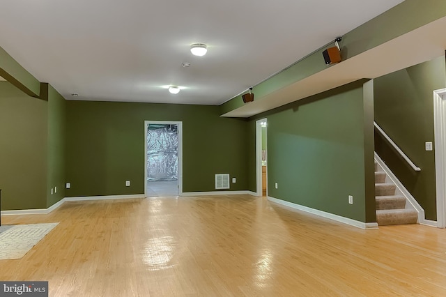 23273 Nicholson St, Hollywood, MD 20636 - basement featuring wood finished floors and stairway