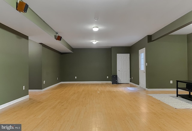 23273 Nicholson St, Hollywood, MD 20636 - below grade area with light wood-style floors and baseboards