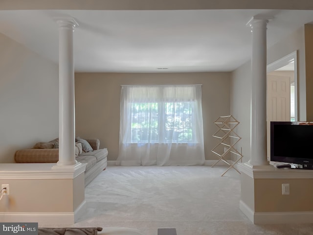 23273 Nicholson St, Hollywood, MD 20636 - living room with ornate columns, carpet floors, and healthy amount of natural light