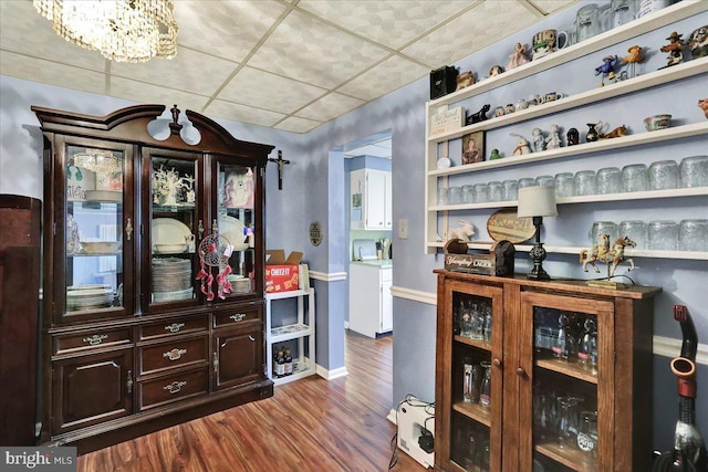 325 Summit Ave, Reading, PA 19607 - bar area featuring dark wood finished floors and a chandelier