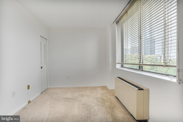 3701 S George Mason Dr Unit 611N, Falls Church, VA 22041 - carpeted empty room featuring radiator heating unit