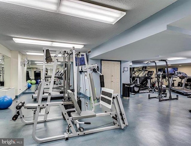 3701 S George Mason Dr Unit 611N, Falls Church, VA 22041 - exercise room featuring a textured ceiling