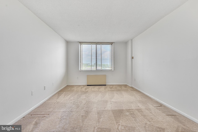 3701 S George Mason Dr Unit 611N, Falls Church, VA 22041 - unfurnished room featuring carpet flooring and a textured ceiling