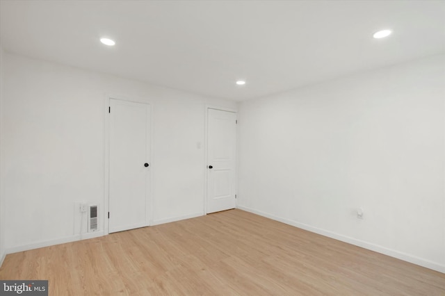 749 Church St, Reading, PA 19601 - unfurnished bedroom with light wood-type flooring and recessed lighting
