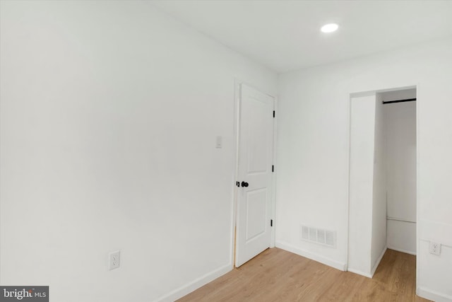 749 Church St, Reading, PA 19601 - unfurnished bedroom with light wood-type flooring and recessed lighting