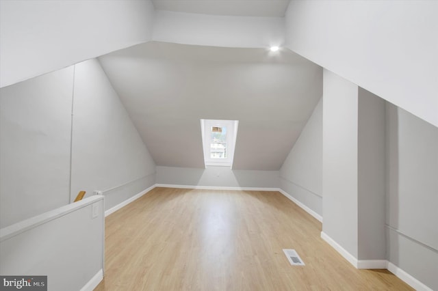 749 Church St, Reading, PA 19601 - additional living space featuring wood finished floors and vaulted ceiling