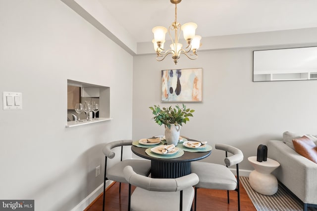 3401 38th St NW Unit 411, Washington, DC 20016 - dining room with wood finished floors and a chandelier