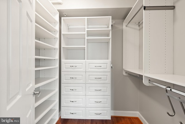 3401 38th St NW Unit 411, Washington, DC 20016 - spacious closet featuring dark wood-style floors