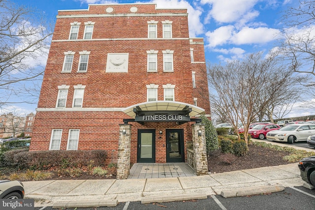 3401 38th St NW Unit 411, Washington, DC 20016 - view of property featuring uncovered parking