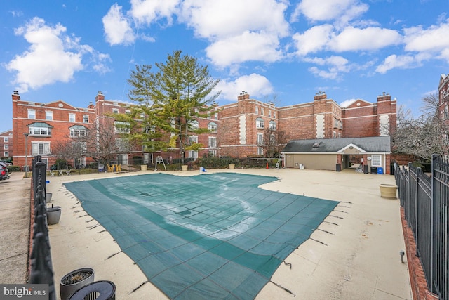 3401 38th St NW Unit 411, Washington, DC 20016 - community pool featuring a patio area
