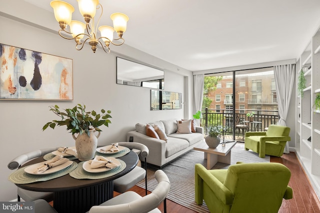 3401 38th St NW Unit 411, Washington, DC 20016 - living room featuring a chandelier and wood finished floors