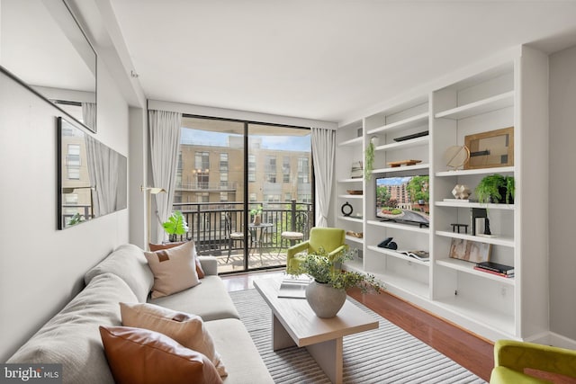 3401 38th St NW Unit 411, Washington, DC 20016 - living area featuring wood finished floors and built in shelves