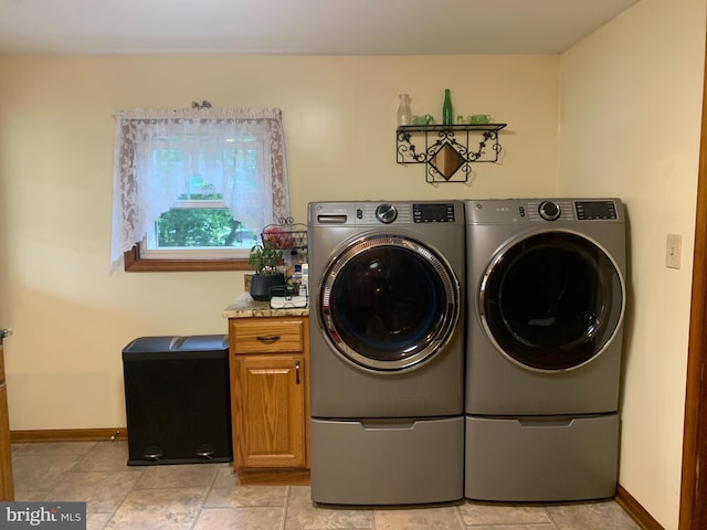 554 Locust St, Bristol, PA 19007 - laundry area featuring washer and dryer and cabinet space