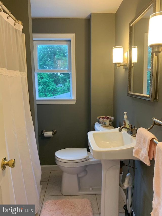 554 Locust St, Bristol, PA 19007 - full bathroom featuring tile patterned flooring and a shower with shower curtain