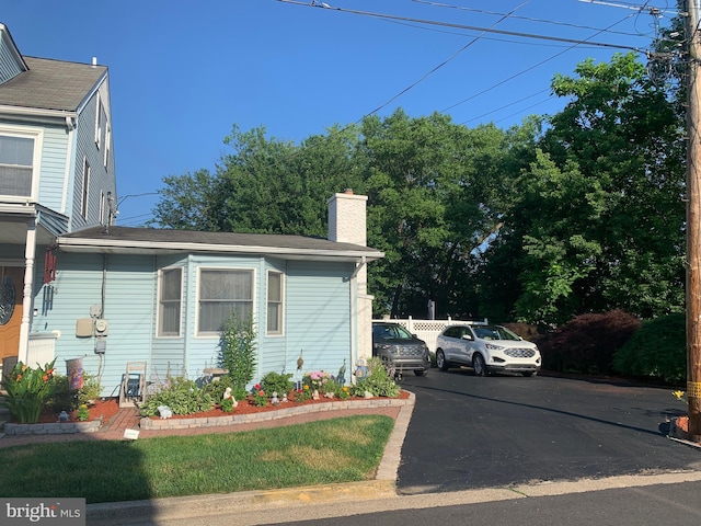 554 Locust St, Bristol, PA 19007 - view of front of property with a chimney