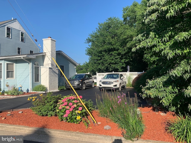 554 Locust St, Bristol, PA 19007 - view of home's exterior featuring a chimney