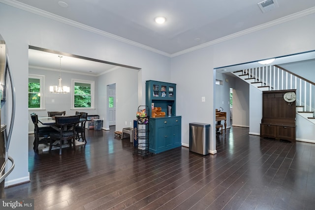 10560 S Faulkner Rd, Faulkner, MD 20632 - living area with stairs, a chandelier, dark wood-style flooring, and ornamental molding
