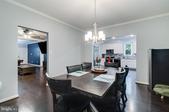 10560 S Faulkner Rd, Faulkner, MD 20632 - dining room with a chandelier, crown molding, dark wood-style floors, and a ceiling fan