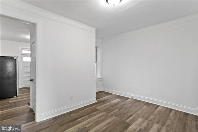 18 Belview Ave, Hagerstown, MD 21742 - empty room featuring dark wood-style floors and baseboards