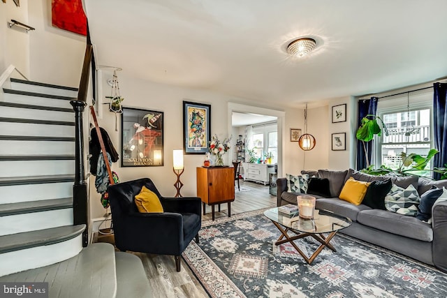 15 Willowbrook Ave, Lansdowne, PA 19050 - living area with wood finished floors, plenty of natural light, and stairs