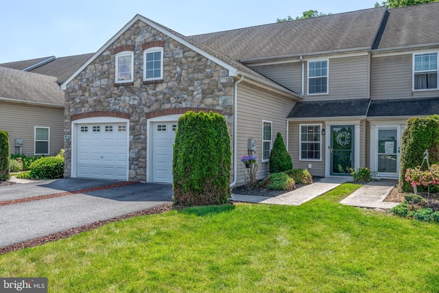 121 Westpoint Dr, Carlisle, PA 17013 - view of property with driveway, stone siding, and a front lawn