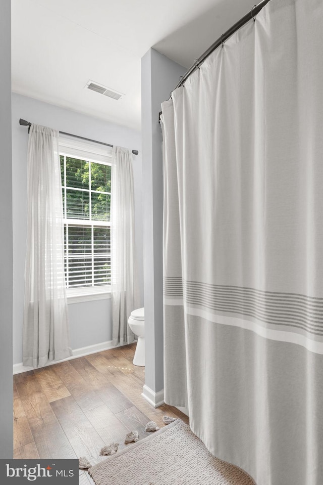 121 Westpoint Dr, Carlisle, PA 17013 - bathroom with wood finished floors and curtained shower