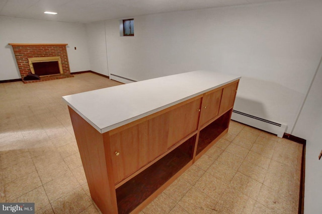 21024 Jefferson Blvd, Smithsburg, MD 21783 - kitchen featuring a baseboard heating unit, light countertops, light flooring, and open shelves