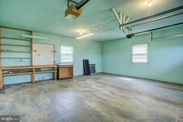 21024 Jefferson Blvd, Smithsburg, MD 21783 - garage with a garage door opener and a workshop area