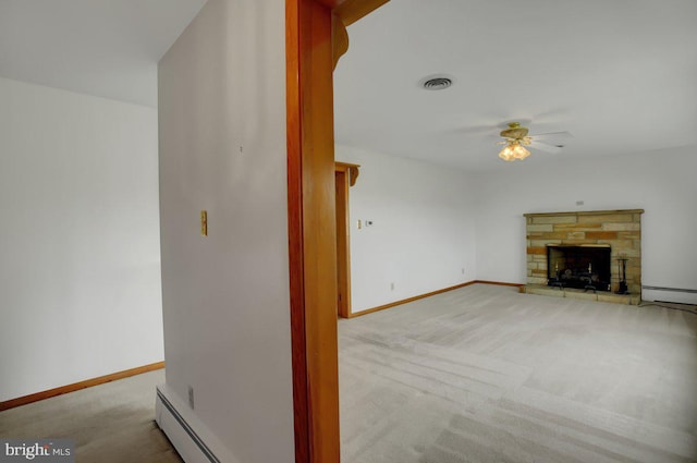 21024 Jefferson Blvd, Smithsburg, MD 21783 - unfurnished living room featuring carpet, ceiling fan, a fireplace, and a baseboard heating unit