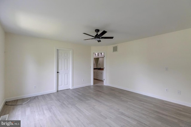 24750 Peterkins Rd, Georgetown, DE 19947 - unfurnished room with wood finished floors and a ceiling fan