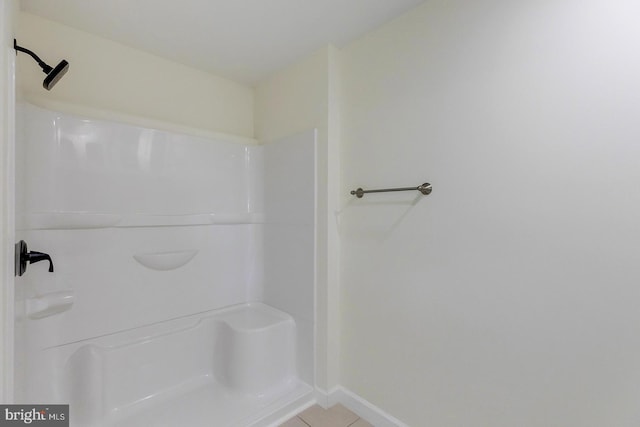 24750 Peterkins Rd, Georgetown, DE 19947 - bathroom with tile patterned floors and a shower