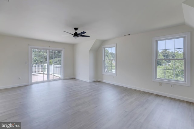 24750 Peterkins Rd, Georgetown, DE 19947 - spare room featuring wood finished floors, ceiling fan, and lofted ceiling