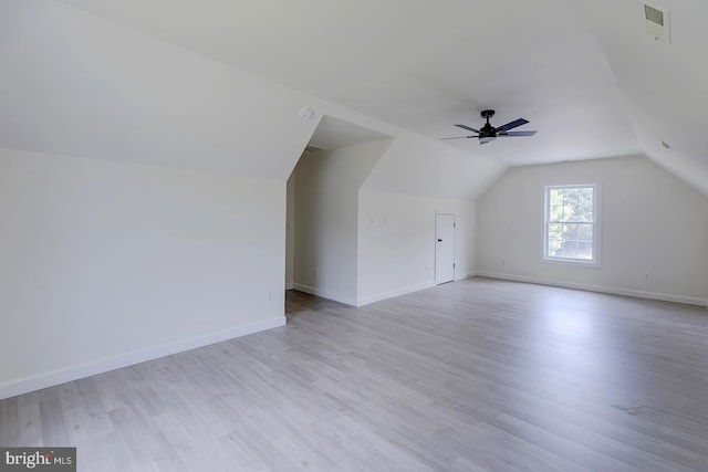 24750 Peterkins Rd, Georgetown, DE 19947 - additional living space with lofted ceiling, light wood finished floors, and a ceiling fan