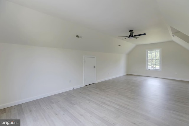 24750 Peterkins Rd, Georgetown, DE 19947 - additional living space featuring light wood finished floors, a ceiling fan, and lofted ceiling