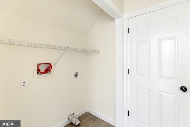 24750 Peterkins Rd, Georgetown, DE 19947 - laundry room featuring hookup for an electric dryer, washer hookup, and wood finished floors
