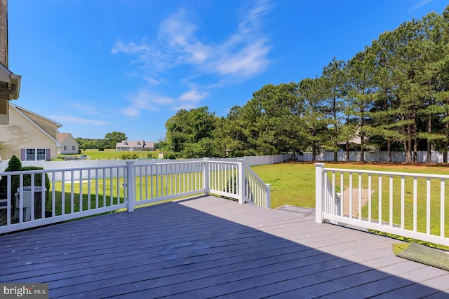 24750 Peterkins Rd, Georgetown, DE 19947 - wooden deck with a fenced backyard