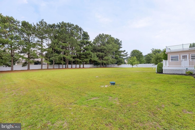 24750 Peterkins Rd, Georgetown, DE 19947 - view of yard featuring a wooden deck