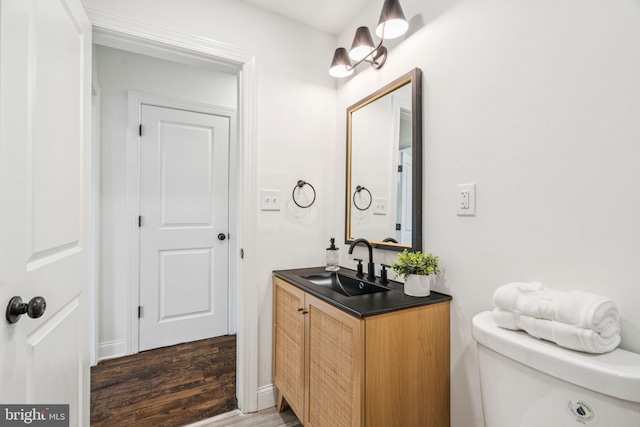 1935 S Hemberger St, Philadelphia, PA 19145 - half bath featuring vanity and wood finished floors