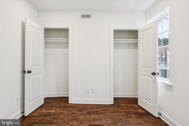 1935 S Hemberger St, Philadelphia, PA 19145 - unfurnished bedroom with two closets and wood finished floors
