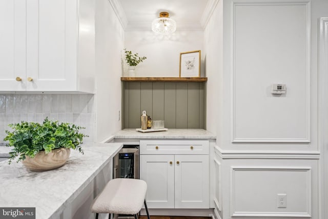 1935 S Hemberger St, Philadelphia, PA 19145 - indoor dry bar featuring tasteful backsplash and crown molding