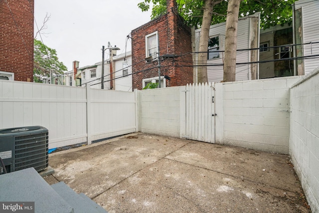 1935 S Hemberger St, Philadelphia, PA 19145 - fenced backyard with a gate and a patio