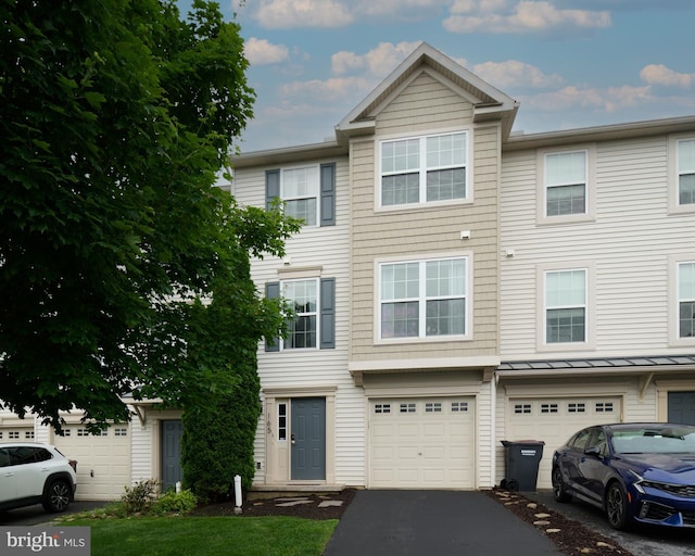 165 Exeter Ln, Bellefonte, PA 16823 - view of property with driveway, an attached garage, a standing seam roof, and a metal roof