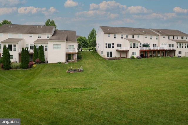 165 Exeter Ln, Bellefonte, PA 16823 - rear view of property with a residential view, a lawn, an outdoor fire pit, and a balcony