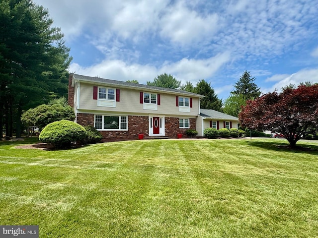 12 Stonelea Dr, Princeton Junction, NJ 08550 - colonial inspired home featuring a front yard and stone siding