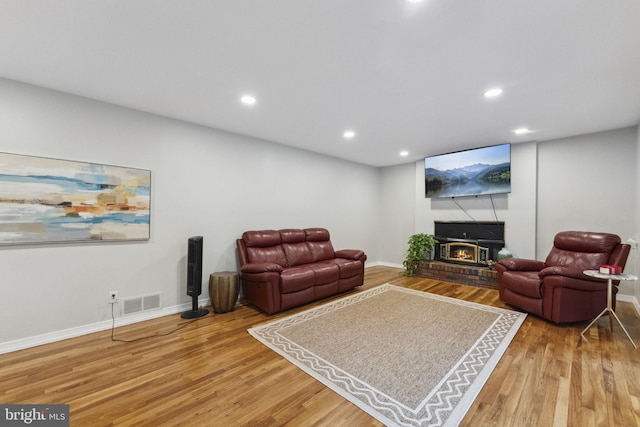 12 Stonelea Dr, Princeton Junction, NJ 08550 - living room with wood finished floors, recessed lighting, and a fireplace
