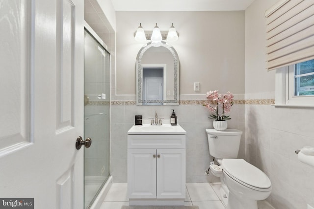 12 Stonelea Dr, Princeton Junction, NJ 08550 - bathroom featuring a shower stall, vanity, tile walls, tile patterned flooring, and wainscoting