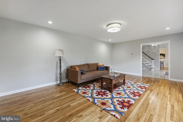 12 Stonelea Dr, Princeton Junction, NJ 08550 - living room with wood finished floors, stairs, and recessed lighting