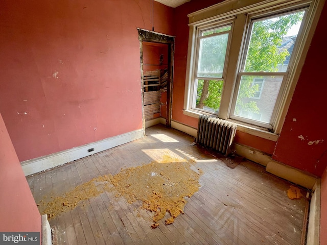 1510 Baird Blvd, Camden, NJ 08103 - unfurnished room with radiator and wood-type flooring